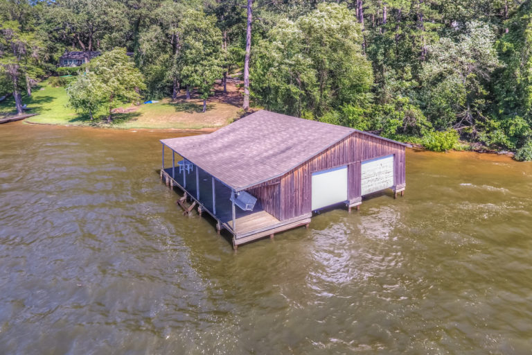 Large Boathouse Waterfront Properties & Golf Course Homes in the Lake